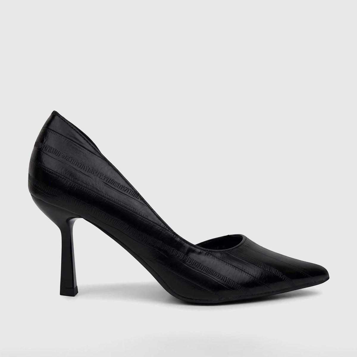 Black ladies dress court shoe with a pointed toe and structured block heel, featuring a subtle striped texture, shown in