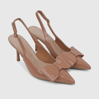 A pair of elegant beige patent leather Bulbul Ladies Dress Slingback Court shoes with pointed toes, delicate bows, and