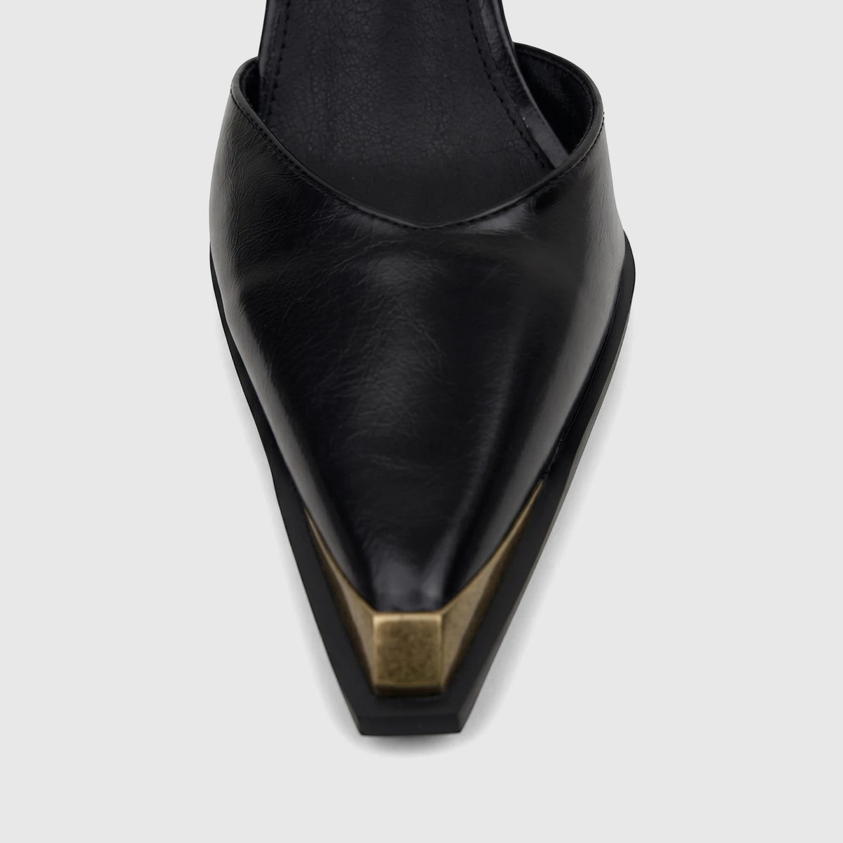 Close-up of a Bulbul Ladies Dress Slingback Court shoe in black leather with a pointed toe and gold cap detail.