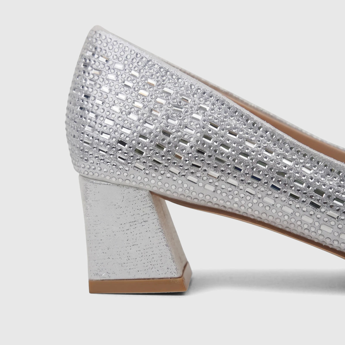 Bulbul Ladies Evening Block Heel Court Shoe in silver, featuring a block heel and rhinestone embellishments, side view.