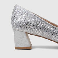 Bulbul Ladies Evening Block Heel Court Shoe in silver, featuring a block heel and rhinestone embellishments, side view.