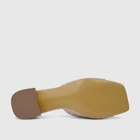 Bottom view of a gold Bulbul Ladies Evening Block Heel Mule, highlighting the sturdy block heel, textured sole, and subtle