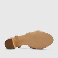 Bottom view of a Bulbul Ladies Evening Block Heel Sandal in champagne, showcasing the textured sole and block heel.