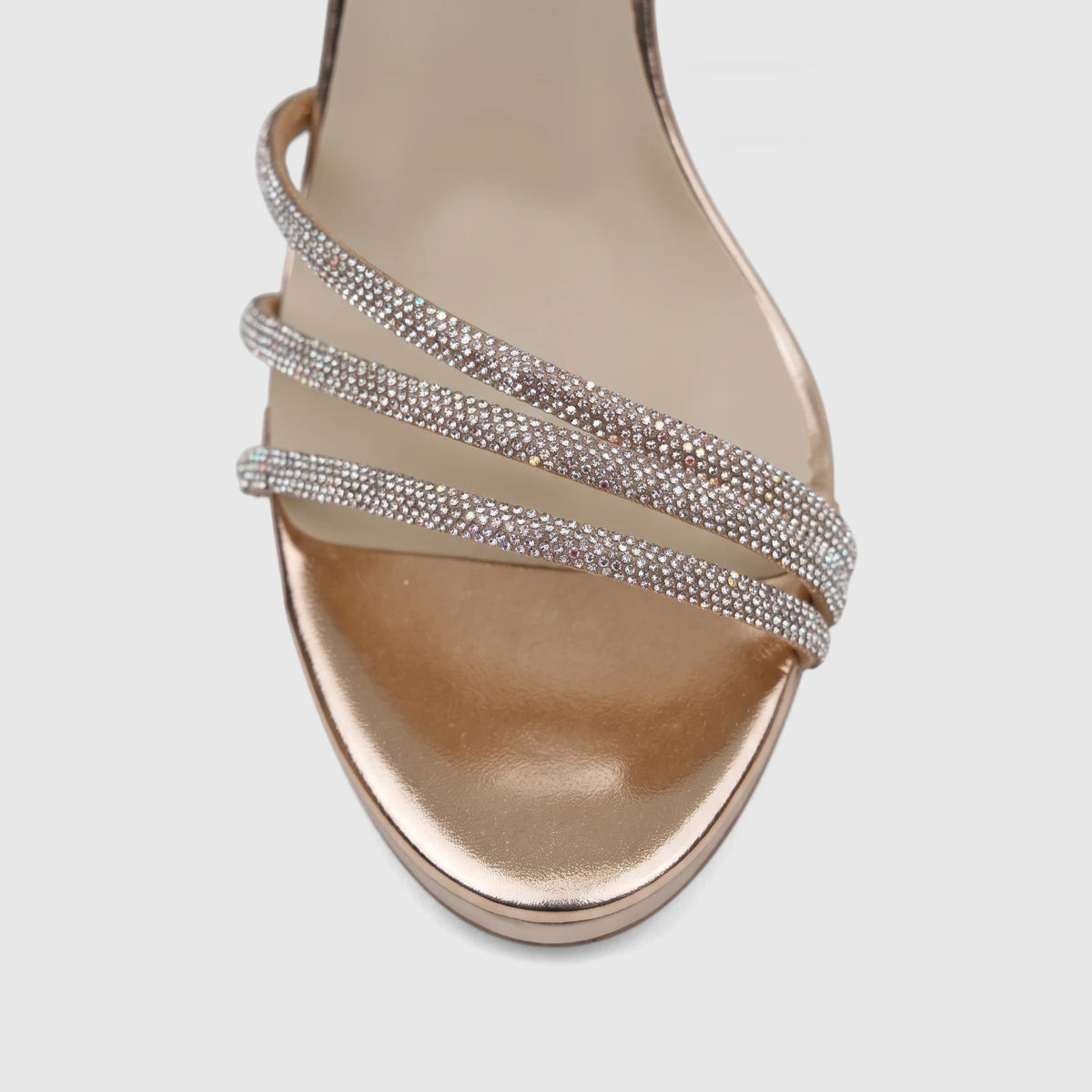 Close-up of a shimmering champagne Bulbul Ladies Evening Block Heel Sandal with multiple crystal-embellished straps.