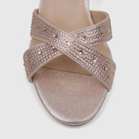 Close-up of a champagne Bulbul Ladies Evening Block Heel Sandal, featuring a glitter finish and rhinestone-embellished