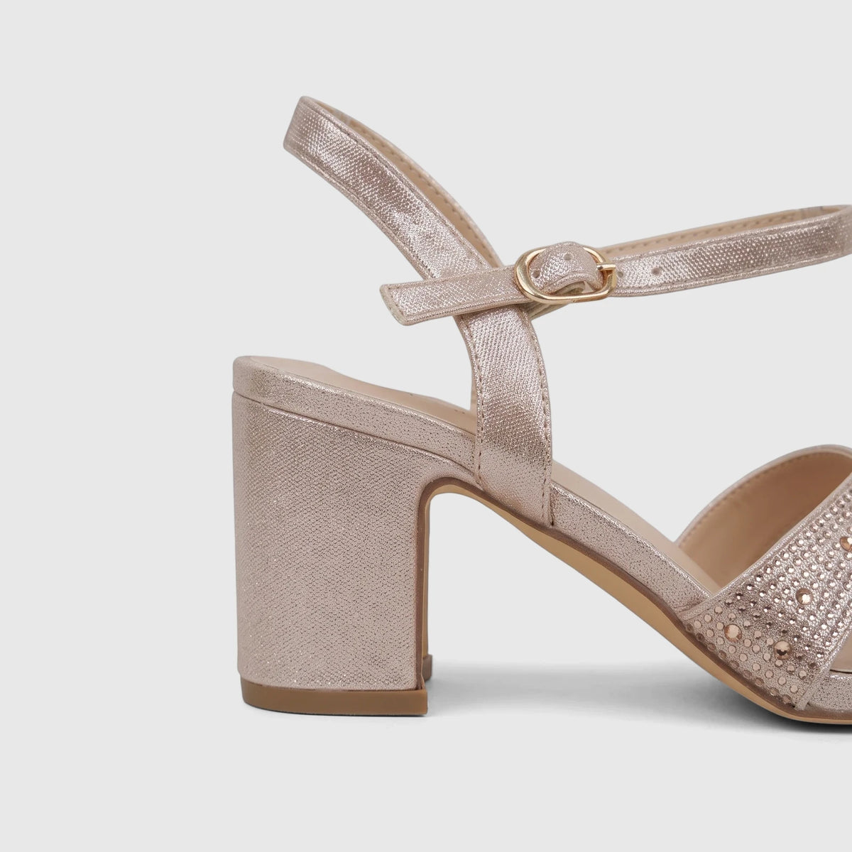 Champagne Bulbul Ladies Evening Block Heel Sandal with an embellished front strap, block heel, and gold buckle, shown from a