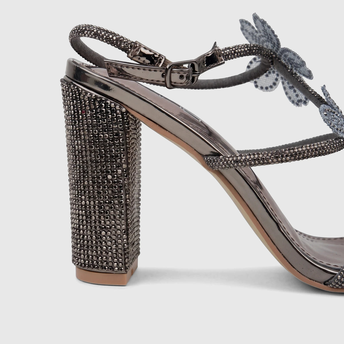 Bulbul Ladies Evening Block Heel Sandal in gunmetal with rhinestone embellishments and an ankle strap, side view.