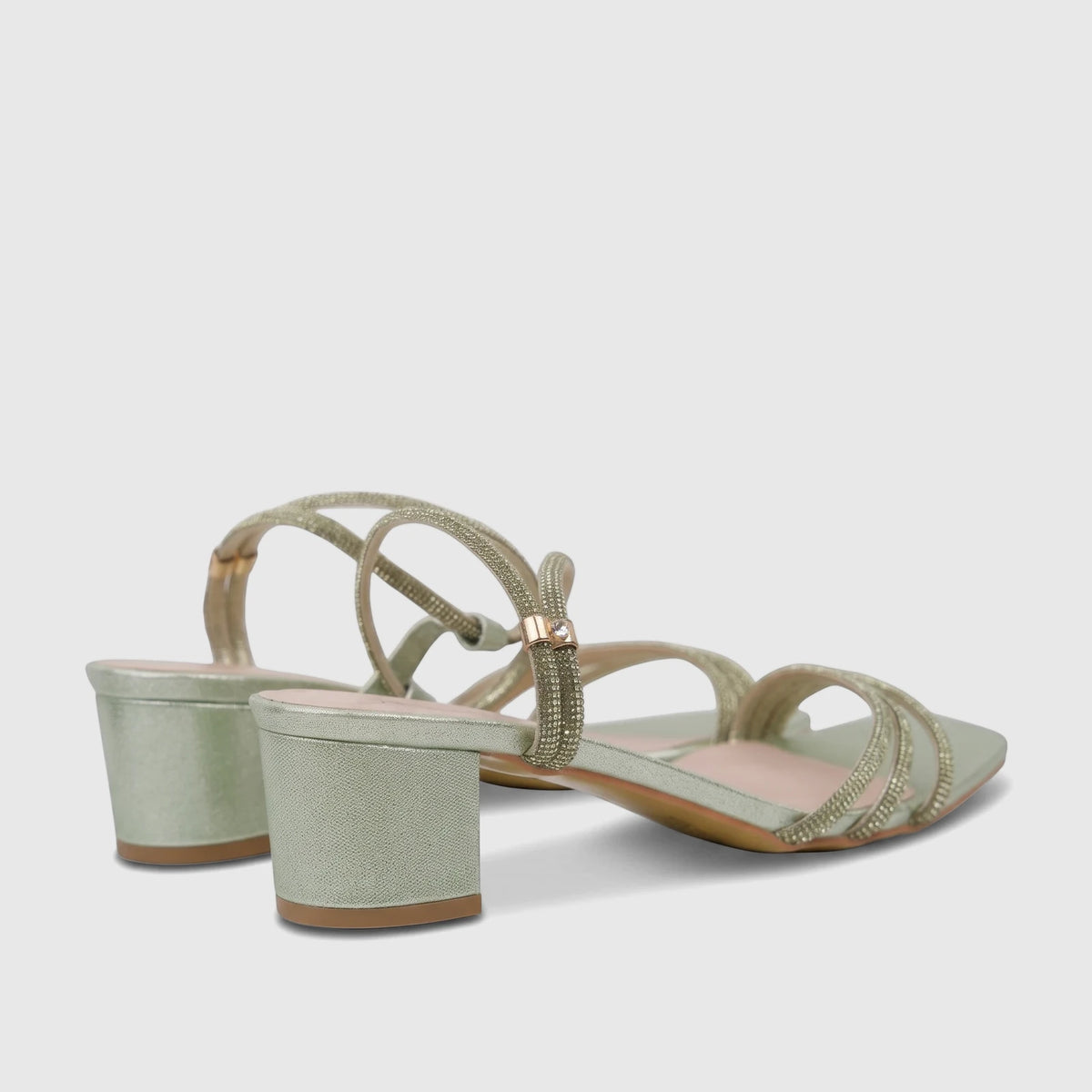 Bulbul Ladies Evening Block Heel Sandals in mint green with rhinestone straps, viewed from a slightly elevated side angle.