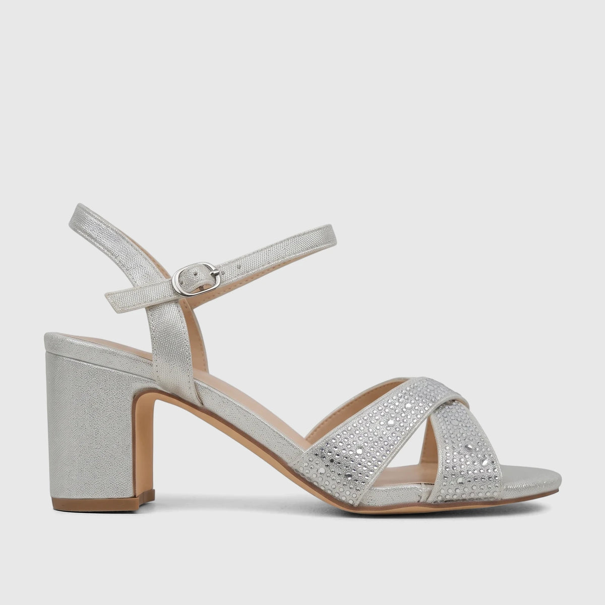 Silver glitter block heel sandal for women, featuring rhinestone embellishments and an ankle strap, shown in a side view.