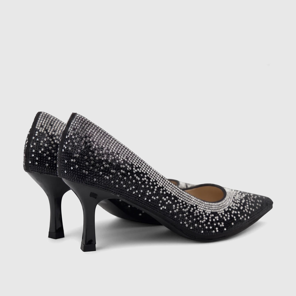 A pair of elegant Bulbul black ladies evening court shoes, adorned with shimmering rhinestones and featuring high stiletto