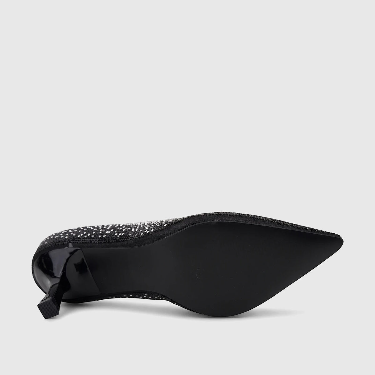 Black sequin Bulbul ladies' evening court shoe with a pointed toe and block heel, viewed from the bottom.