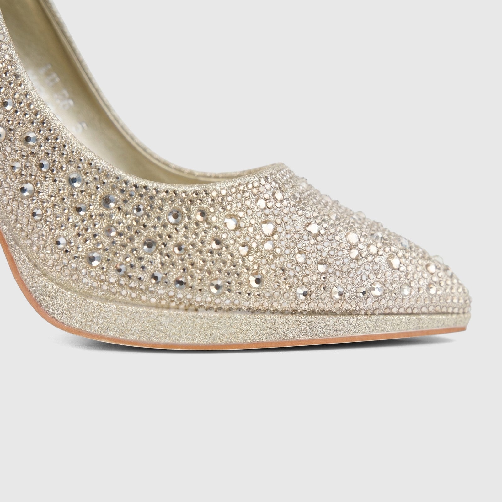 Close-up of a gold Bulbul Ladies Evening Court Shoe LU026, intricately embellished with shimmering rhinestones, featuring a
