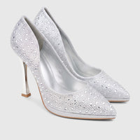 A pair of silver Bulbul Ladies Evening Court Shoes LU026, adorned with sparkling rhinestones, featuring a pointed toe and