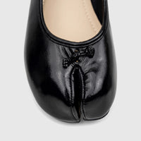 Close-up of a single black patent leather Bulbul Ladies Evening Pump LU051, featuring a split-toe design and a decorative