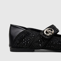 Bulbul black ladies evening pump with a low heel, embellished with black rhinestones and a silver-tone buckle, side view.