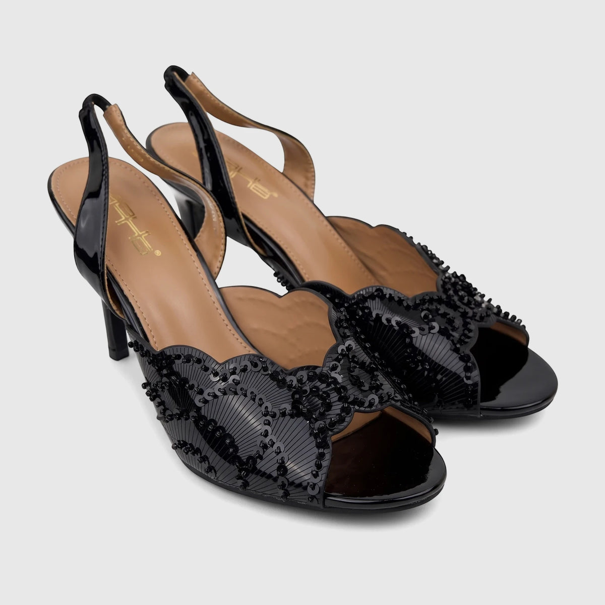 Bulbul Ladies Evening Slingback Sandals in black patent leather with intricate sequin and bead embellishments, seen from an