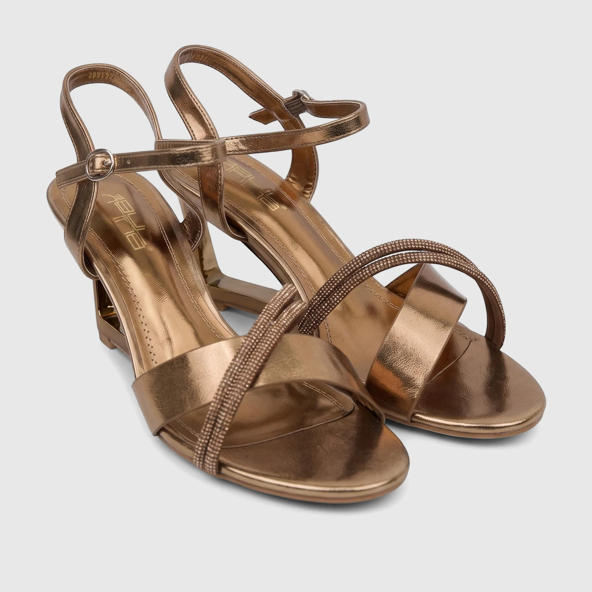 Bulbul Ladies Evening Slingback Sandal in bronze, featuring rhinestone-embellished straps and a wedge heel, showcased.