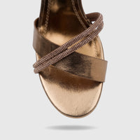 Bronze metallic slingback sandal for ladies with rhinestone embellished criss-cross straps, close-up view.