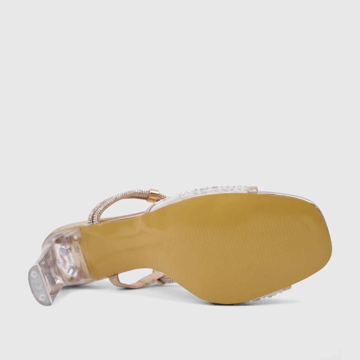 Bulbul Ladies Evening Slingback Sandal in gold, featuring sparkling rhinestone straps and a clear block heel, viewed from