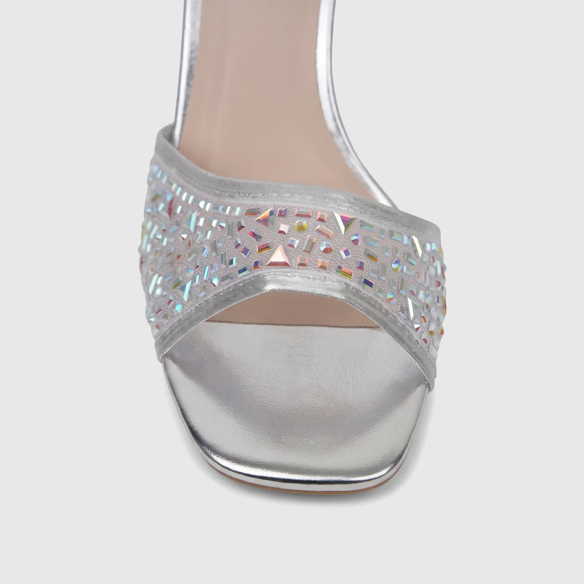 Bulbul Ladies Evening Slingback Sandal in silver, featuring a rhinestone-embellished strap and a metallic finish.