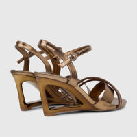 A pair of bronze Bulbul Ladies Evening Slingback wedge sandals, featuring an ankle strap with buckle and embellished front