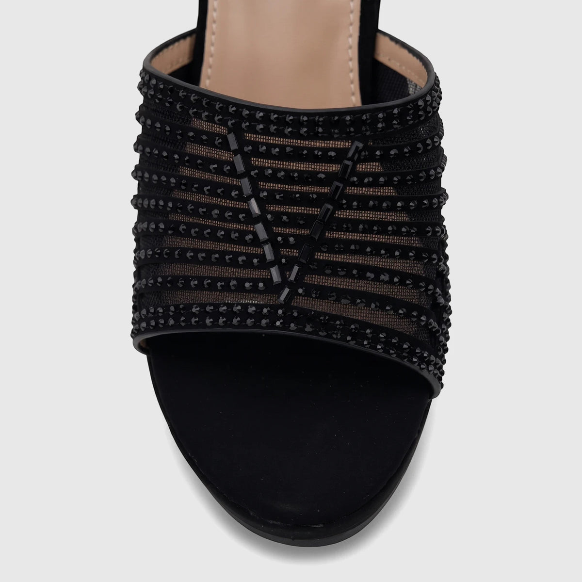 Close-up of a black Bulbul Ladies Evening Wedge Sandal featuring an embellished beaded mesh strap and a black sole.