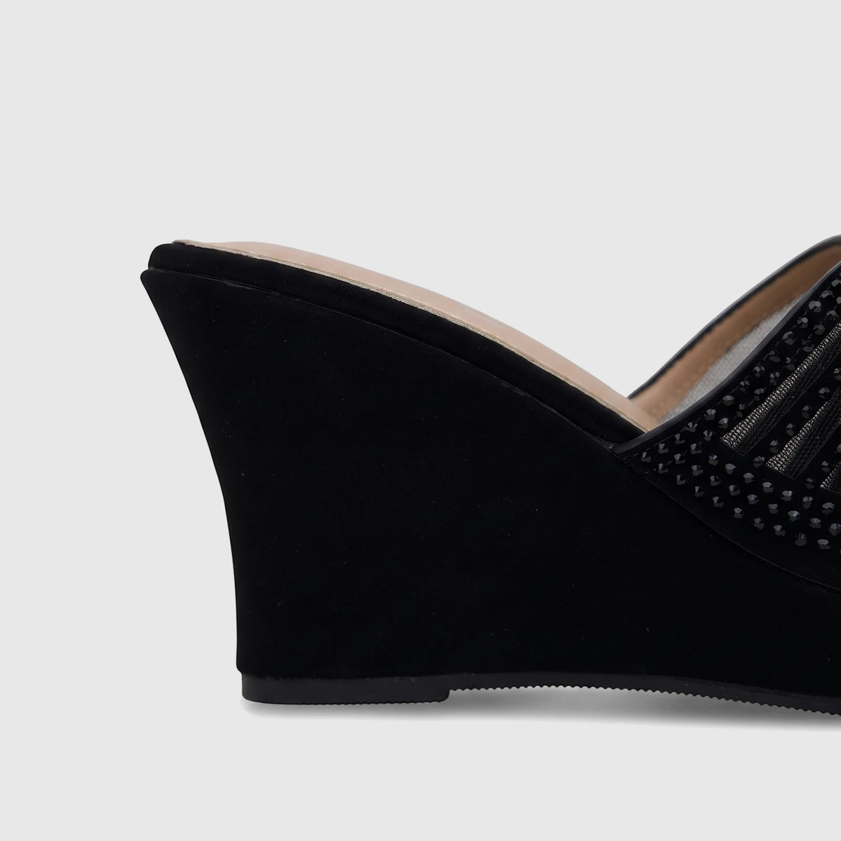 Black Bulbul Ladies Evening Wedge Sandal with an embellished mesh upper and a sturdy wedge heel, viewed from the side.