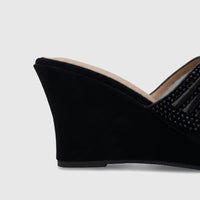 Black Bulbul Ladies Evening Wedge Sandal with an embellished mesh upper and a sturdy wedge heel, viewed from the side.