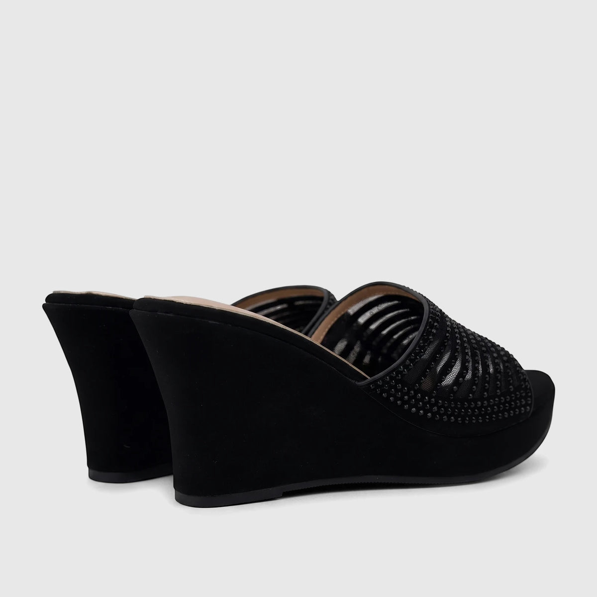 A pair of black Bulbul Ladies Evening Wedge Sandals, featuring an open-toe design with a beaded mesh upper and a comfortable
