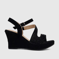 Black Bulbul Ladies Evening Wedge Sandal with high wedge heel, ankle strap, and sparkling rhinestone-embellished front strap.