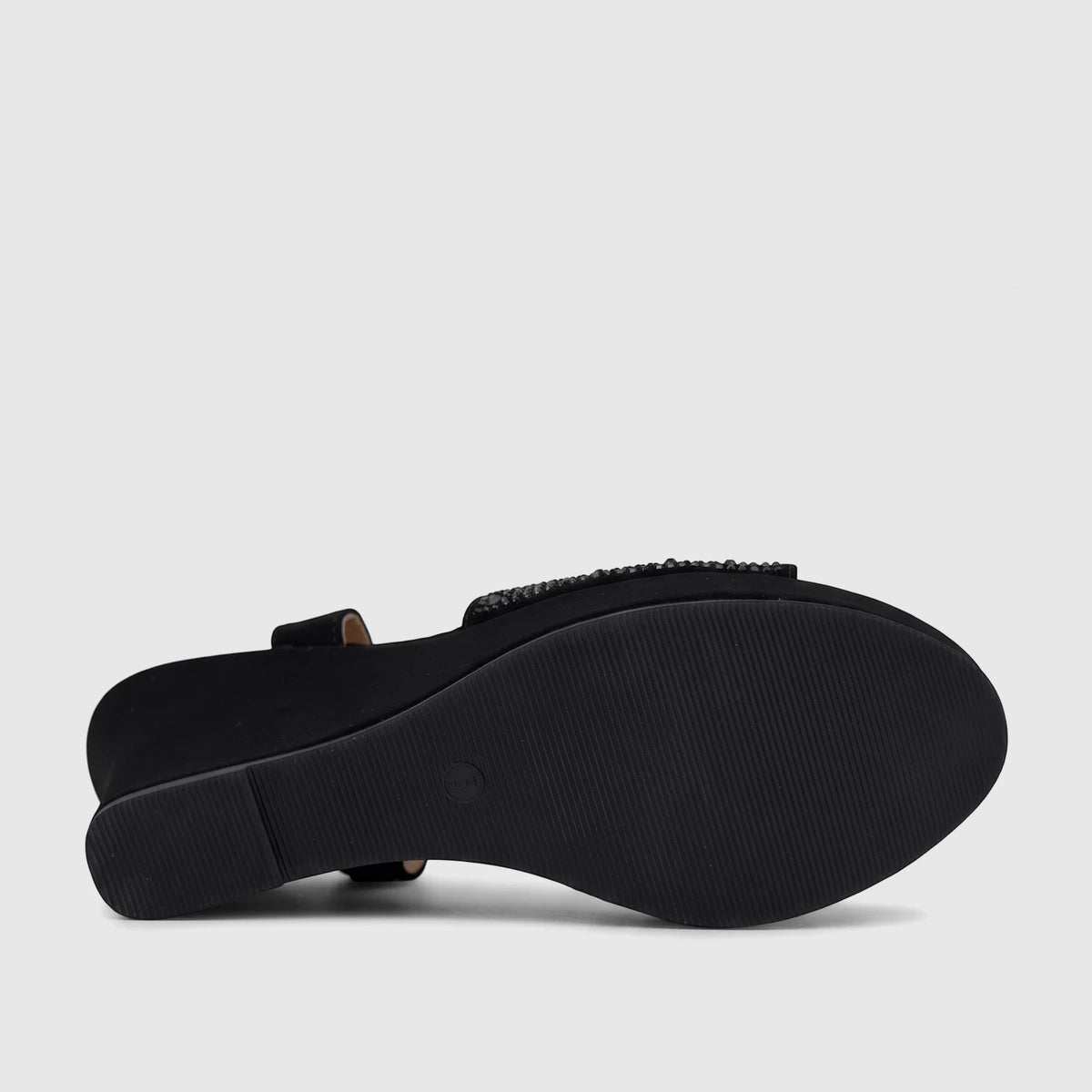 Black Bulbul ladies evening wedge sandal, viewed from the side-rear showing the textured sole and embellished strap details.