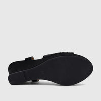 Black Bulbul ladies evening wedge sandal, viewed from the side-rear showing the textured sole and embellished strap details.