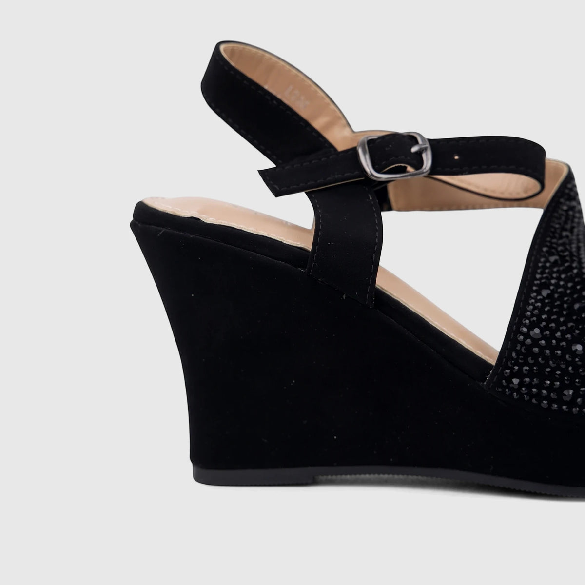 Black Bulbul Ladies Evening Wedge Sandal with a buckled ankle strap and studded upper, shown in a side view.