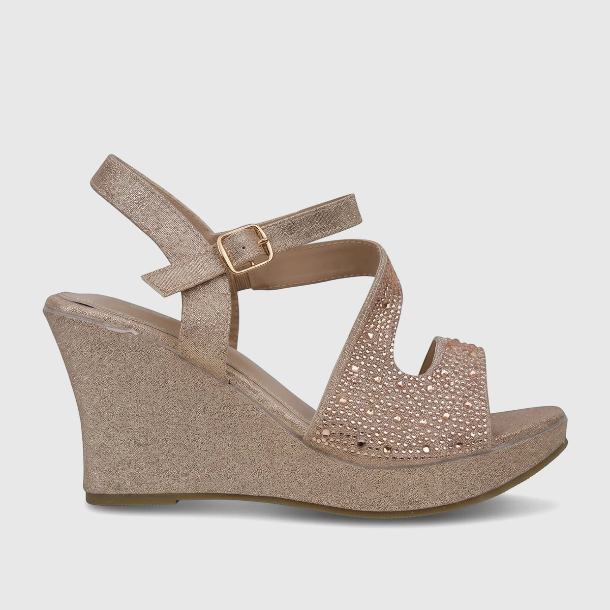 Champagne glitter women's evening wedge sandals with rhinestone embellishments, side view.