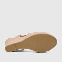 Champagne glitter Bulbul Ladies Evening Wedge Sandal, seen from the bottom revealing the rubber sole, textured grooves, and
