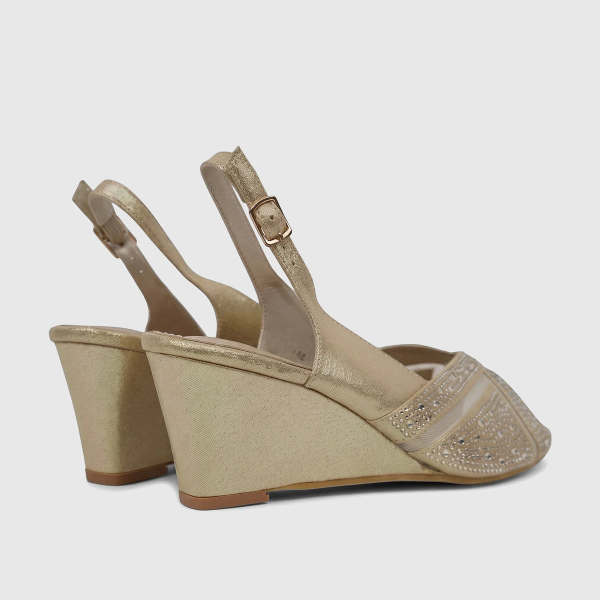 Dark gold ladies' evening wedge sandals featuring rhinestone embellishments on the toe strap and transparent ankle straps,