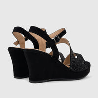 Bulbul Ladies Evening Wedge Sandals in black, featuring a wedge heel and an embellished front strap, viewed from a