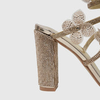 Gold Bulbul Ladies spiral strap evening heel sandal, featuring a rhinestone-covered block heel and delicate floral