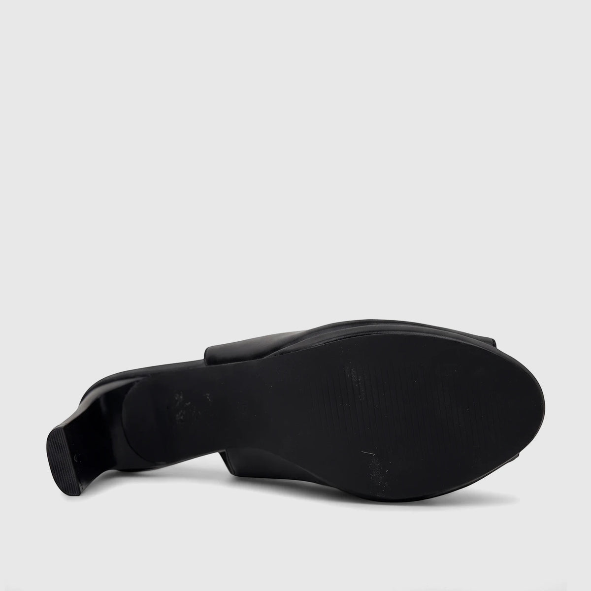 Black Bulbul Ladies Slingback Peep Toe Sandal, high-heeled, shown from the bottom-up view highlighting its sole and block