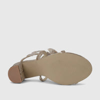 Gold Bulbul Ladies' evening heel sandal with spiral rhinestone straps and a block heel, viewed from the underside.