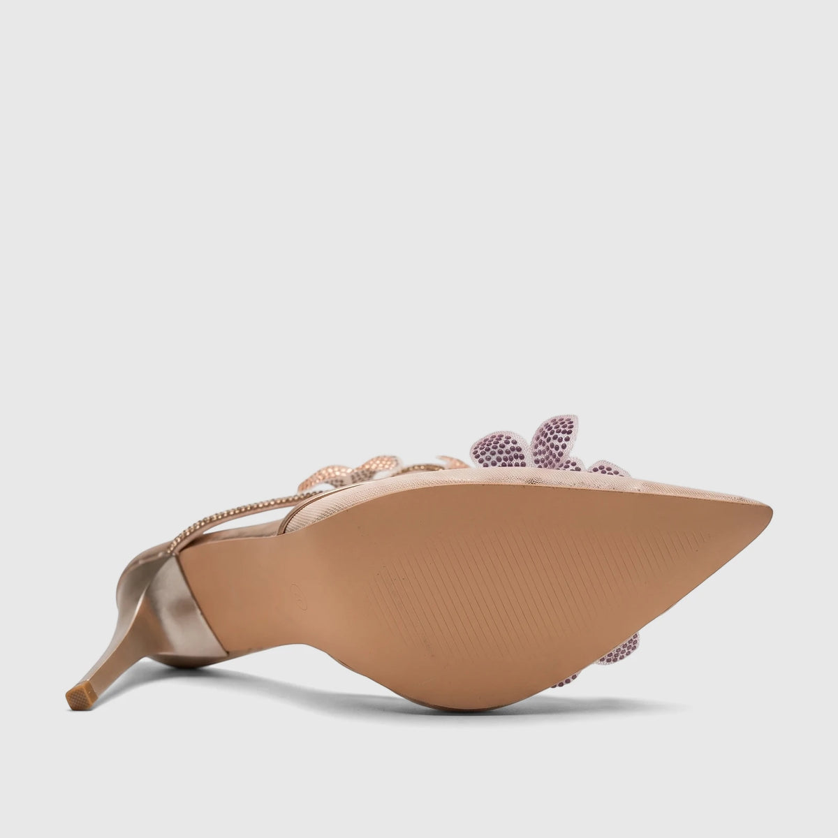 Rose gold Bulbul Ladies Spiral Strap Evening Heel Sandal, shown from a bottom view highlighting the sole and embellished