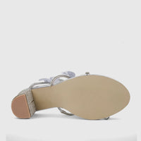 Silver Bulbul Ladies Spiral Strap Evening Heel Sandal, featuring a rhinestone-covered block heel, viewed from the bottom.