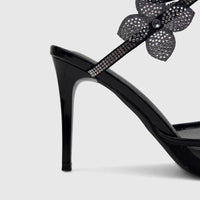 Black patent leather spiral strap evening high heel sandal for ladies, featuring intricate rhinestone embellishments.