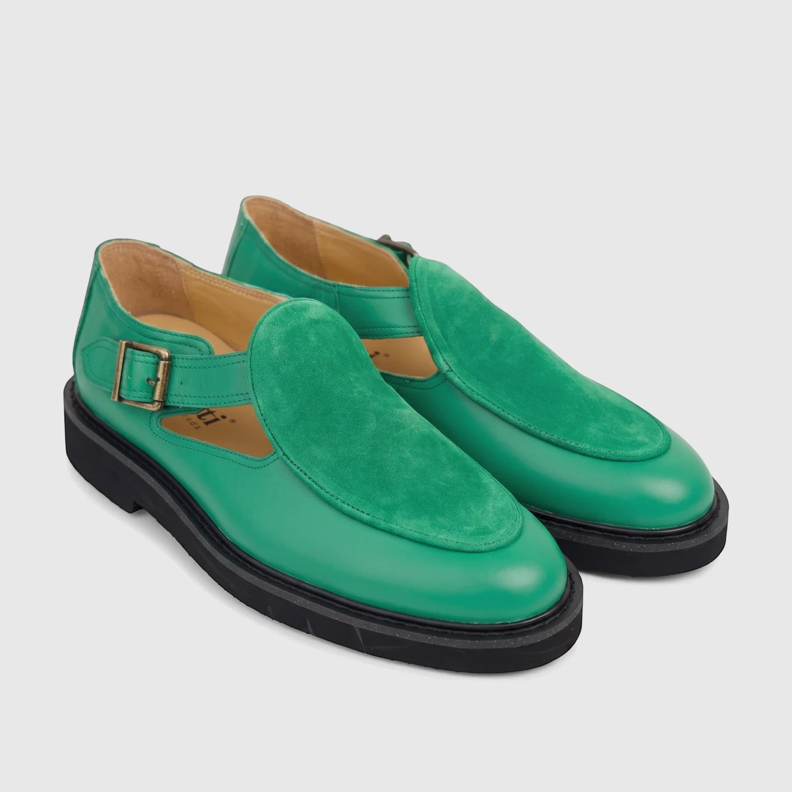 A pair of Bulletti B7817M Majesty Green leather and suede chunky sole sandals with a brass buckle.