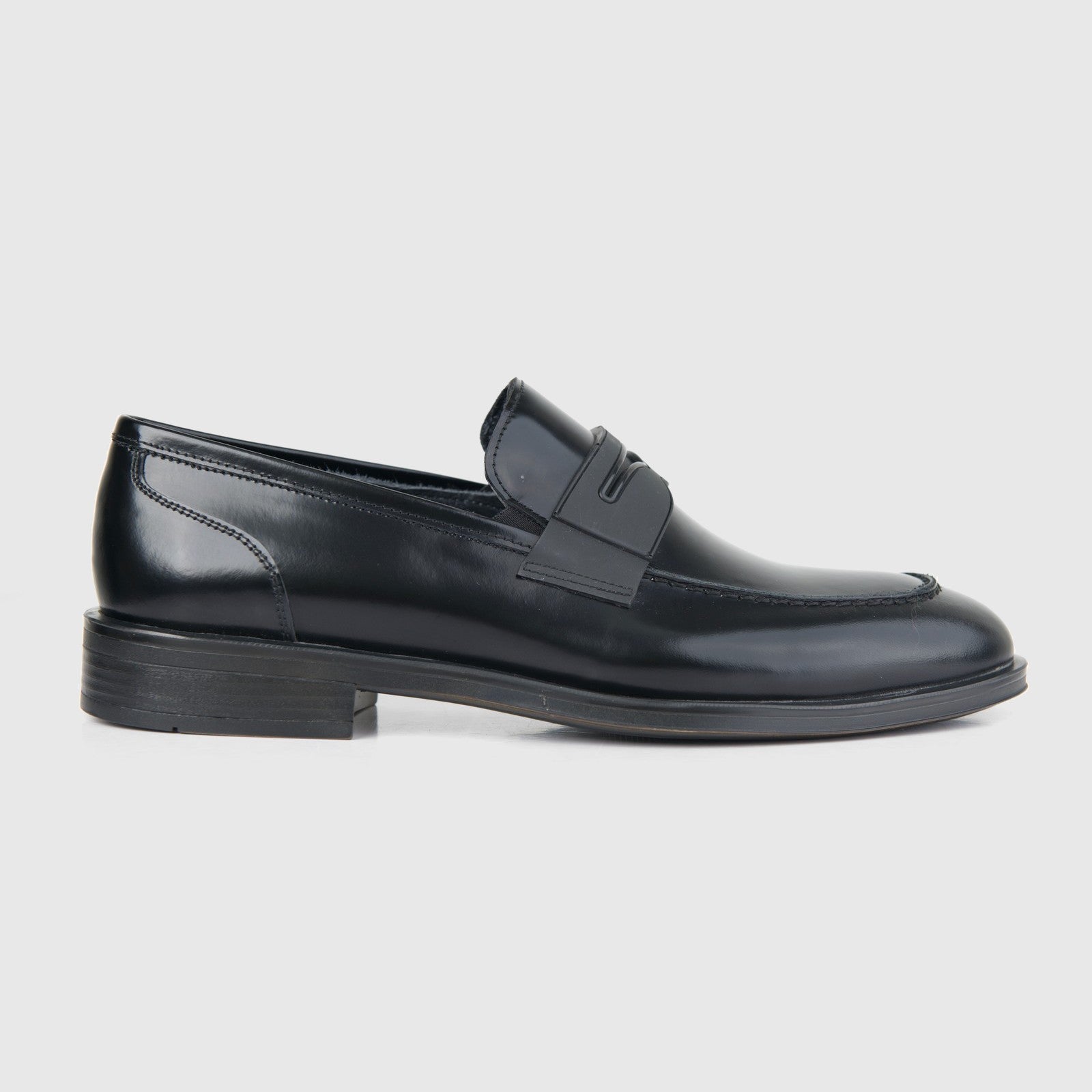 Bulletti men's leather dress slip on 52-126 in black hi shine, side view loafer with penny strap and low heel.