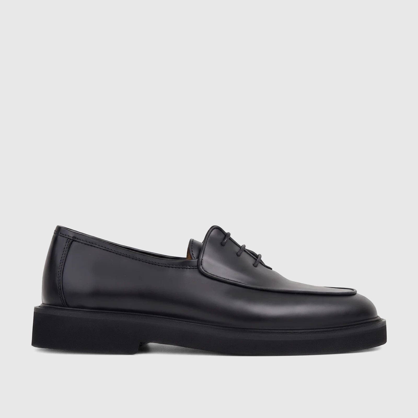 Bulletti Men's black leather chunky sole lace-up shoe, B7799M Odyssey Black Patent, shown from a side view.