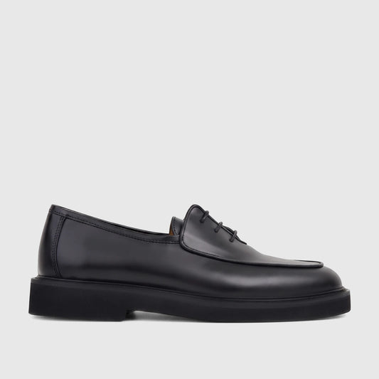 Bulletti Men's black leather chunky sole lace-up shoe, B7799M Odyssey Black Patent, shown from a side view.
