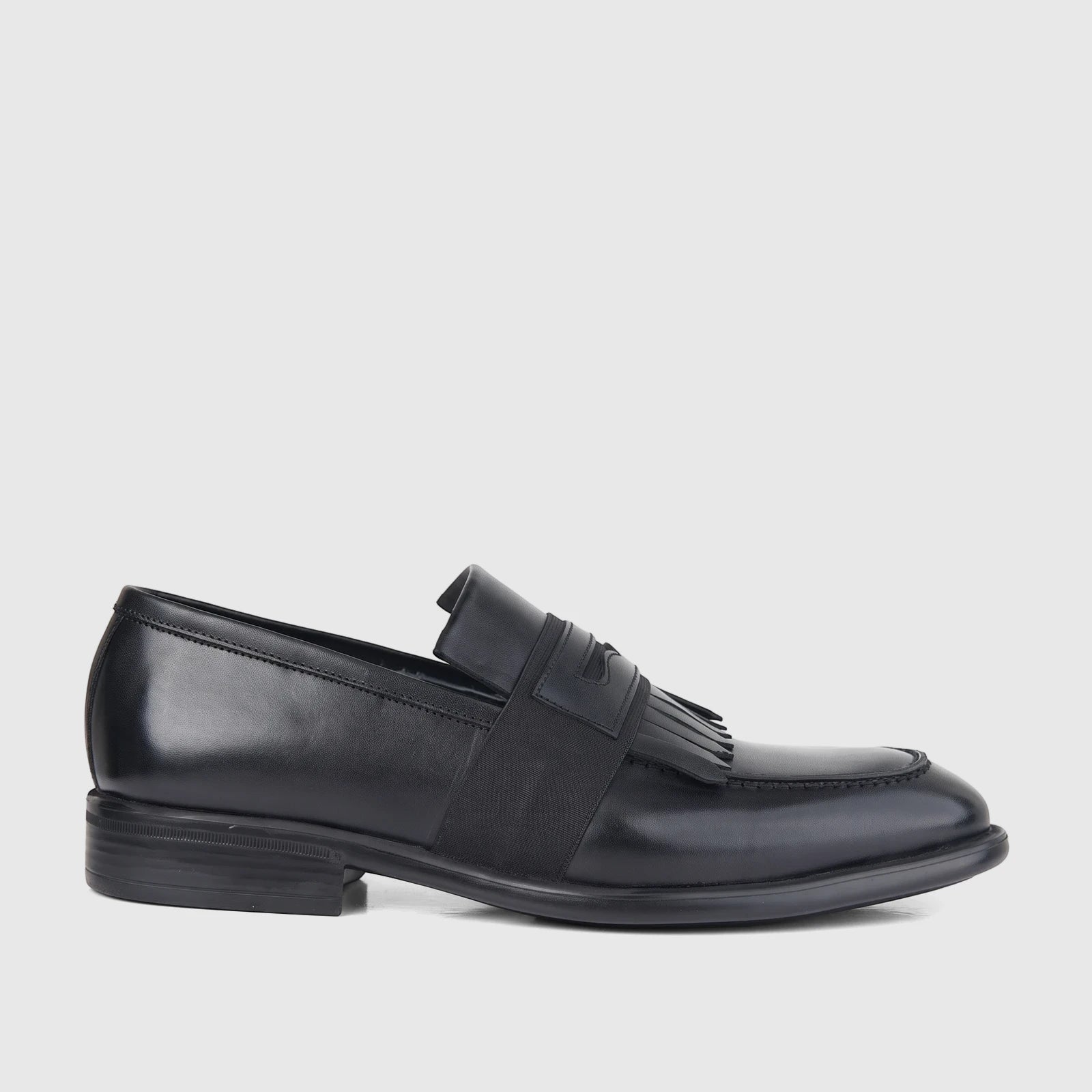 Bulletti men's black leather dress slip-on loafer with fringe detail and a low block heel, side view.