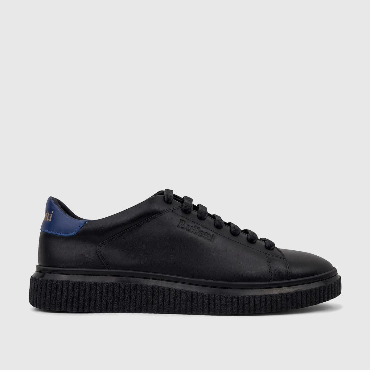 A single black leather Bulletti men's sneaker, model HASM-003, with a ribbed platform sole and blue heel accent, presented
