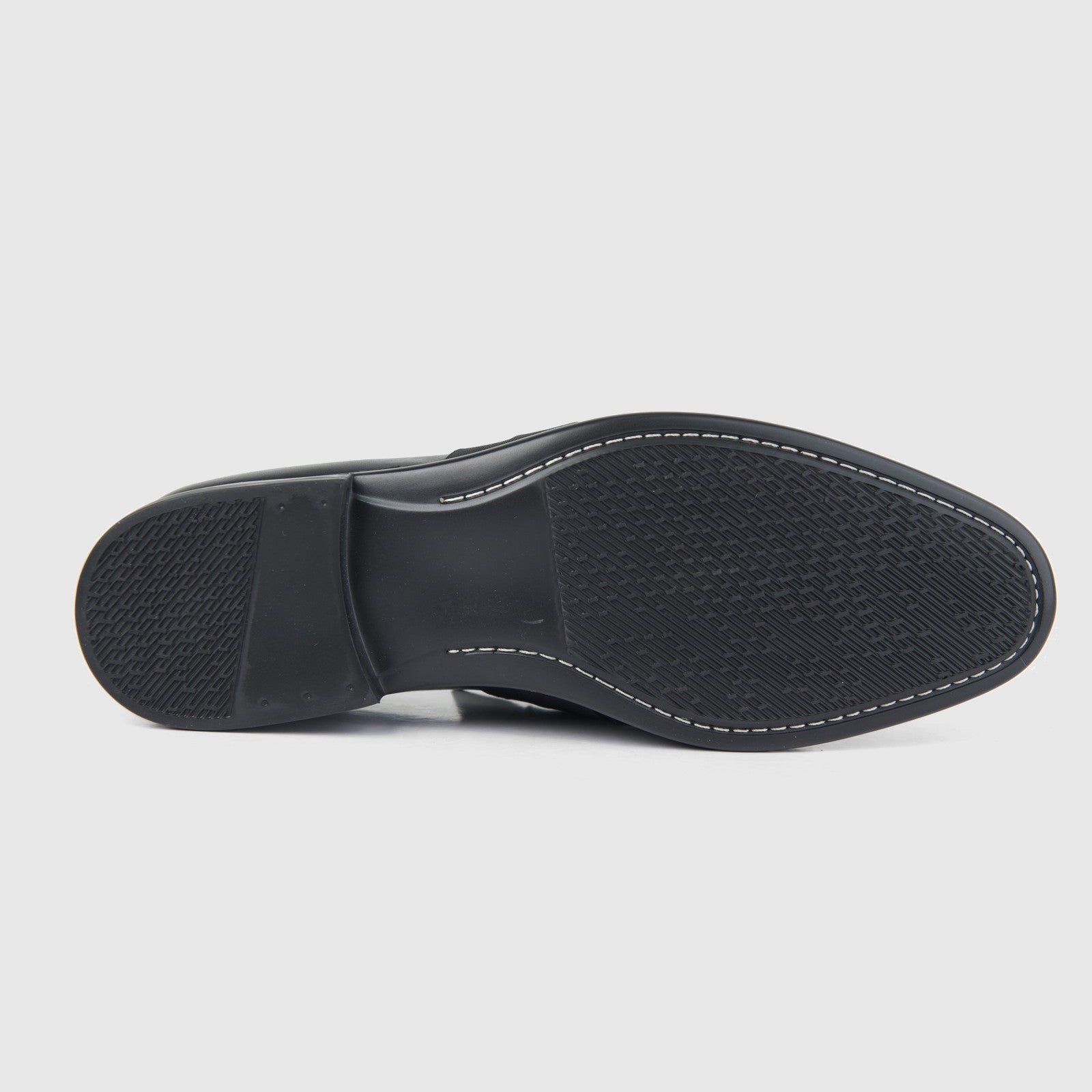 Bulletti men's leather dress slip-on with fringe in black, bottom view showing textured rubber outsole tread.